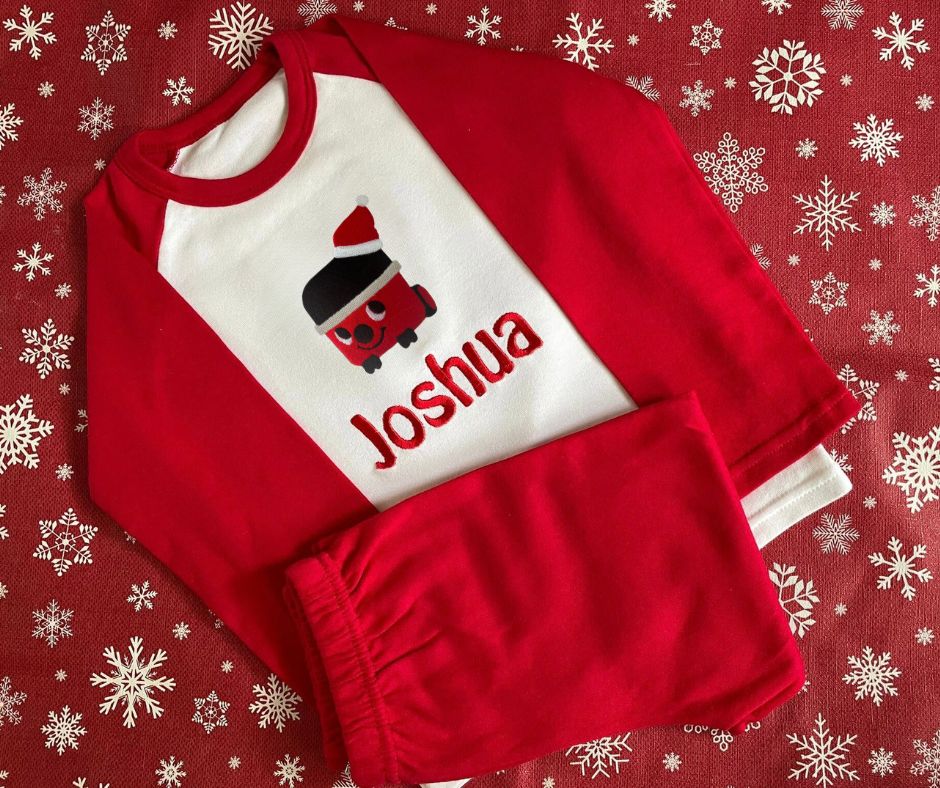 Christmas Henry Personalised Pyjamas. Embroidered with name & red hoover design.